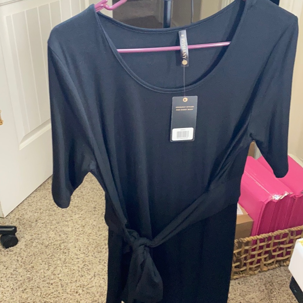 Brand new piphany top with a tie